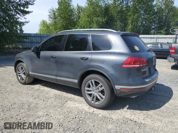 2015 Volkswagen Touareg Lux с VIN WVGEP9BP0FD006992, выставлен на аукционе Copart как лот 59524445 с пробегом 169 822 миль миль и Списание • Salvage title. История ставок и продаж доступна на DreamBid. Изображение 2.