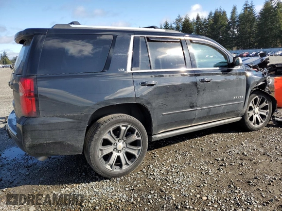 2015 Chevrolet Tahoe LTZ z VIN 1GNSKCKC5FR638011, wystawiony jako Copart lot #49269395 z przebiegiem 127 427 mil mil oraz Szkoda całkowita • Salvage title. Historia ofert i sprzedaży dostępna na DreamBid. Obrazek 3.