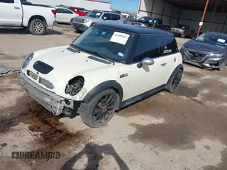 2006 MINI Hardtop S with VIN WMWRE335X6TL19914, listed as a IAAI auction lot 41680041 with 213,011 mi miles and . Bid and sale history available at DreamBid. Image 2.