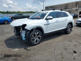 2023 Volkswagen Atlas SEL with VIN 1V2BE2CA4PC216788, listed as a Copart auction lot 65115764 with 13,033 mi miles and Salvage title. Bid and sale history available at DreamBid. Image 1.