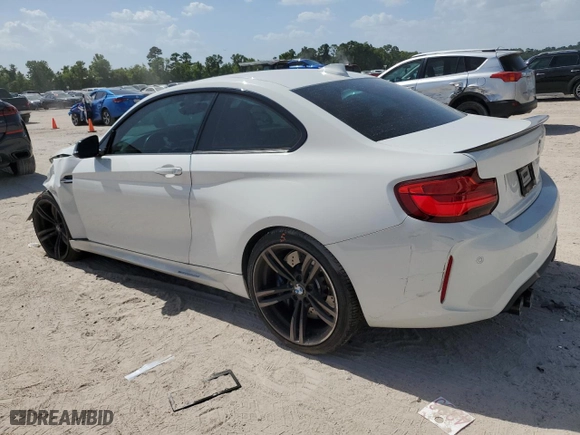 2018 BMW M2 with VIN WBS1J5C51JVD36522, listed as a Copart auction lot 61423854 with 57,933 mi miles and Salvage Title. Bid and sale history available at carsss.com. Image 2.
