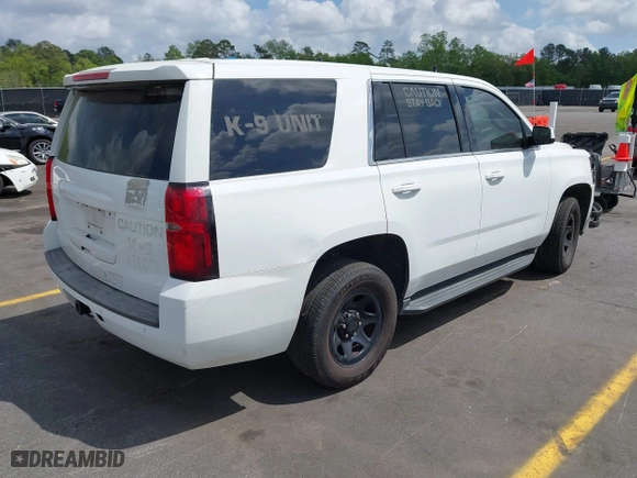 2016 Chevrolet Tahoe Commercial with VIN 1GNLCDEC5GR423300, listed as a IAAI auction lot 41967399 with 147,429 mi miles. Bid and sale history available at carsss.com. Image 4.