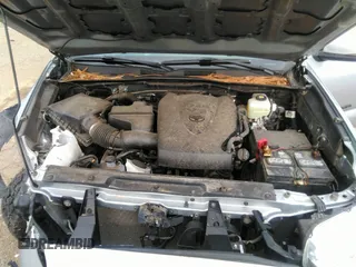 2021 Toyota Tacoma 4WD SR5 with VIN 3TMDZ5BN1MM105694, listed as a IAAI auction lot 41233853 with 1 mi miles. Bid and sale history available at carsss.com. Image 10.