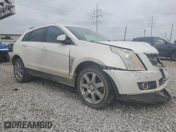2012 Cadillac SRX Performance Collection z VIN 3GYFNBE32CS615988, wystawiony jako Copart lot #61198415 z przebiegiem 156 135 mil mil oraz Szkoda całkowita • Salvage title. Historia ofert i sprzedaży dostępna na DreamBid. Obrazek 4.