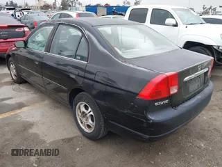 2001 Honda Civic LX with VIN JHMES16571S010117, listed as a IAAI auction lot 42207199 with 194,825 mi miles and . Bid and sale history available at DreamBid. Image 3.