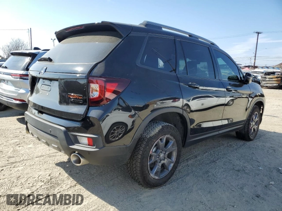 2024 Honda Passport TrailSport z VIN 5FNYF8H67RB010869, wystawiony jako Copart lot #50761425 z przebiegiem 5 720 mil mil oraz Szkoda całkowita • Salvage title. Historia ofert i sprzedaży dostępna na DreamBid. Obrazek 3.