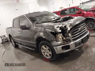 2015 Ford F-150 XLT with VIN 1FTEW1EG8FKF16961, listed as a IAAI auction lot 41670621 with 1 mi miles. Bid and sale history available at carsss.com. Image 1.