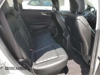 2019 Ford Edge SEL with VIN 2FMPK4J90KBB40298, listed as a Copart auction lot 56953585 with 110,639 mi miles and Salvage title. Bid and sale history available at DreamBid. Image 11.