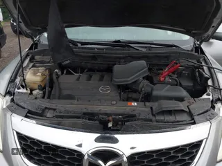 2010 Mazda CX-9 Sport with VIN JM3TB2MA6A0210360, listed as a IAAI auction lot 42711756 with 169,844 mi miles and . Bid and sale history available at DreamBid. Image 10.
