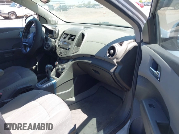 2012 Chevrolet Sonic LT with VIN 1G1JC5SH1C4178839, listed as a IAAI auction lot 42142454 with 143,140 mi miles and . Bid and sale history available at DreamBid. Image 5.