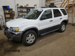 2006 Ford Escape XLT with VIN 1FMCU03106KC14923, listed as a Copart auction lot 52727095 with 126,842 mi miles and Salvage Title. Bid and sale history available at DreamBid. Image 1.