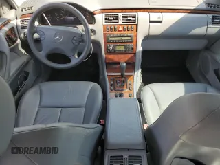 2000 Mercedes-Benz E-Class with VIN WDBJF65J5YB054237, listed as a Copart auction lot 76315974 with 95,092 mi miles and Salvage Title. Bid and sale history available at carsss.com. Image 8.