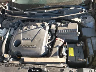 2016 Nissan Maxima SL z VIN 1N4AA6AP5GC382668, wystawiony jako IAAI lot #41451440 z przebiegiem 163 884 mil mil oraz . Historia ofert i sprzedaży dostępna na DreamBid. Obrazek 10.