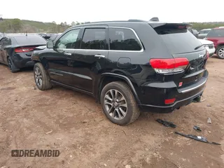 2017 Jeep Grand Cherokee Overland z VIN 1C4RJECG4HC878258, wystawiony jako IAAI lot #41361352 z przebiegiem 137 574 mil mil oraz . Historia ofert i sprzedaży dostępna na DreamBid. Obrazek 3.