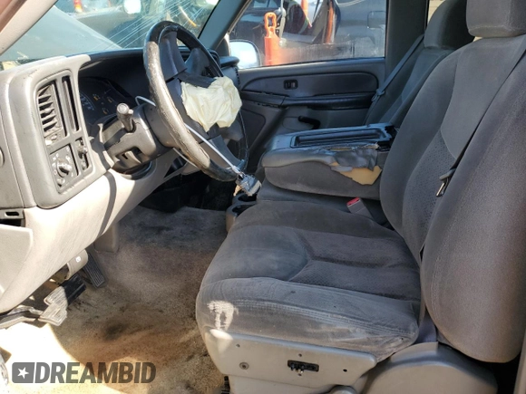 2003 Chevrolet Tahoe LS with VIN 1GNEC13V03R257774, listed as a Copart auction lot 55116535 with 178,709 mi miles and Salvage title. Bid and sale history available at DreamBid. Image 7.