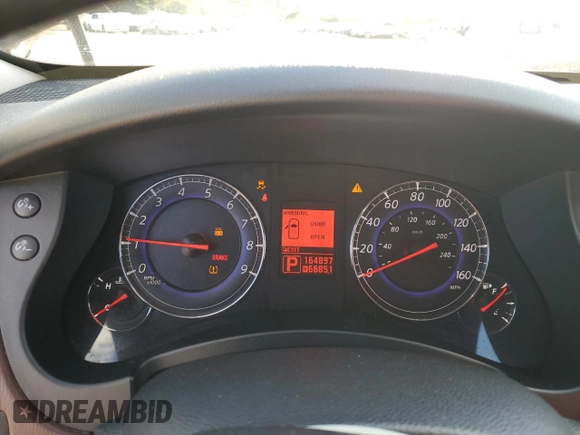 2010 Infiniti EX Journey with VIN JN1AJ0HR0AM753738, listed as a Copart auction lot 74167364 with 164,897 mi miles and Salvage Title. Bid and sale history available at DreamBid. Image 9.
