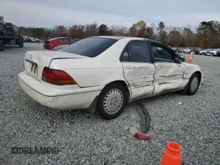1996 Acura RL with VIN JH4KA9652TC000077, listed as a Copart auction lot 82430394 with 201,807 mi miles and Salvage Title. Bid and sale history available at carsss.com. Image 3.