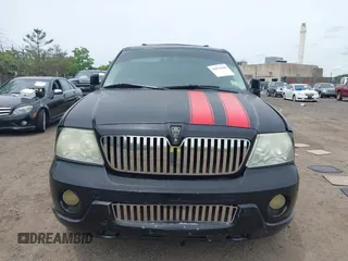 2003 Lincoln Navigator Luxury z VIN 5LMFU28R13LJ43211, wystawiony jako IAAI lot #42331844 z przebiegiem 166 139 mil mil oraz . Historia ofert i sprzedaży dostępna na DreamBid. Obrazek 12.