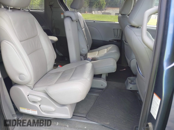 2016 Toyota Sienna XLE with VIN 5TDYK3DC0GS766059, listed as a IAAI auction lot 42214738 with 143,001 mi miles and . Bid and sale history available at DreamBid. Image 8.