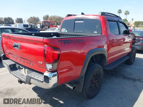2018 Toyota Tacoma SR5 with VIN 3TMAZ5CN2JM067292, listed as a IAAI auction lot 41851959 with 70,988 mi miles and . Bid and sale history available at DreamBid. Image 4.