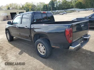 2011 GMC Canyon SLE1 with VIN 1GTH6MFE8B8102114, listed as a Copart auction lot 74137234 with 150,598 mi miles and Salvage Title. Bid and sale history available at carsss.com. Image 2.