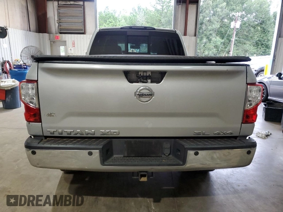 2016 Nissan Titan XD PRO-4X with VIN 1N6BA1F45GN506049, listed as a Copart auction lot 70746074 with 153,093 mi miles and Salvage Title. Bid and sale history available at carsss.com. Image 6.