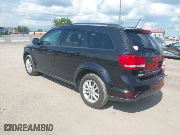 2013 Dodge Journey SXT with VIN 3C4PDDBG1DT615217, listed as a IAAI auction lot 42728052 with 234,347 mi miles and . Bid and sale history available at DreamBid. Image 3.