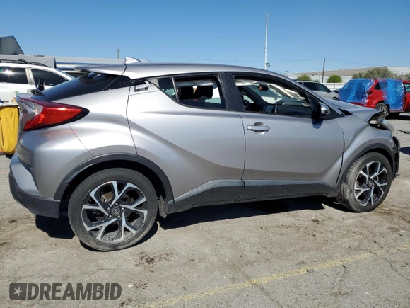 2018 Toyota C-HR XLE z VIN NMTKHMBX5JR014024, wystawiony jako Copart lot #56367465 z przebiegiem 79 882 mil mil oraz Szkoda całkowita • Salvage title. Historia ofert i sprzedaży dostępna na DreamBid. Obrazek 3.