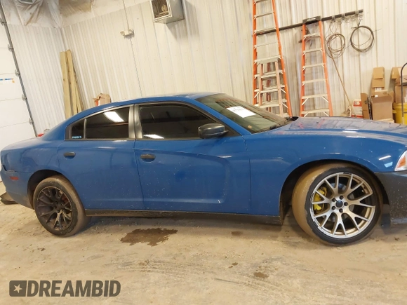 2014 Dodge Charger Police z VIN 2C3CDXAT5EH218901, wystawiony jako IAAI lot #41723531 z przebiegiem 216 643 mil mil oraz . Historia ofert i sprzedaży dostępna na DreamBid. Obrazek 13.