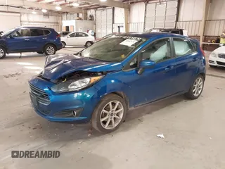 2019 Ford Fiesta SE with VIN 3FADP4EJ6KM124270, listed as a IAAI auction lot 40962134 with 122,757 mi miles. Bid and sale history available at carsss.com. Image 2.