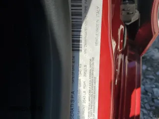 2014 Maserati Ghibli z VIN ZAM57XSA7E1126742, wystawiony jako Copart lot #57495135 z przebiegiem 50 077 mil mil oraz Szkoda całkowita • Salvage title. Historia ofert i sprzedaży dostępna na DreamBid. Obrazek 12.