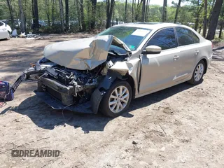 2013 Volkswagen Jetta SE with VIN 3VWDX7AJ9DM253430, listed as a IAAI auction lot 41997354 with 97,493 mi miles and . Bid and sale history available at DreamBid. Image 2.
