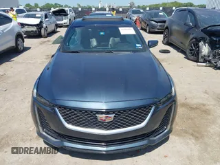 2021 Cadillac CT5 Luxury z VIN 1G6DW5RKXM0144424, wystawiony jako IAAI lot #41985803 z przebiegiem 65 555 mil mil oraz . Historia ofert i sprzedaży dostępna na DreamBid. Obrazek 12.