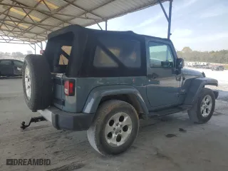 2015 Jeep Wrangler Sahara with VIN 1C4AJWBG9FL729104, listed as a Copart auction lot 51065615 with 216,779 mi miles and Clean Title. Bid and sale history available at carsss.com. Image 3.