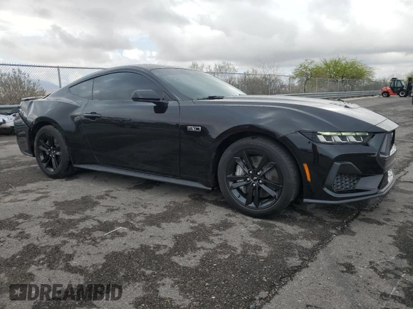 2024 Ford Mustang GT with VIN 1FA6P8CF3R5411497, listed as a Copart auction lot 55979545 with 6,607 mi miles and Salvage title. Bid and sale history available at DreamBid. Image 4.