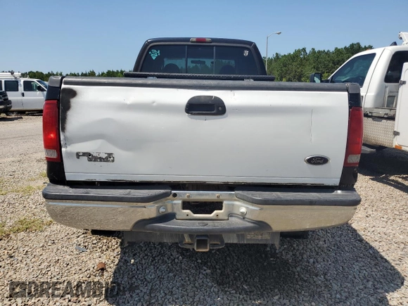 2000 Ford F-350 XL with VIN 1FTSW31F3YEB20854, listed as a Copart auction lot 61717865 with 209,288 mi miles and Salvage title. Bid and sale history available at DreamBid. Image 6.