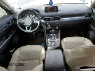 2017 Mazda CX-5 Touring z VIN JM3KFBCL7H0212955, wystawiony jako Copart lot #46096525 z przebiegiem 94 606 mil mil oraz Szkody całkowita. Historia ofert i sprzedaży dostępna na DreamBid. Obrazek 8.