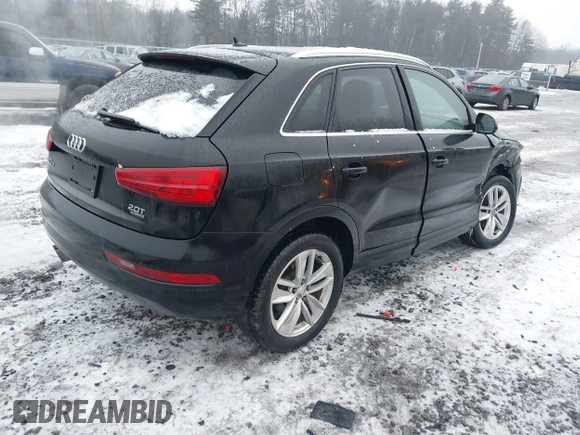 2017 Audi Q3 Premium Plus z VIN WA1JCCFS5HR000986, wystawiony jako IAAI lot #41471543 z przebiegiem 68 087 mil mil oraz . Historia ofert i sprzedaży dostępna na DreamBid. Obrazek 4.