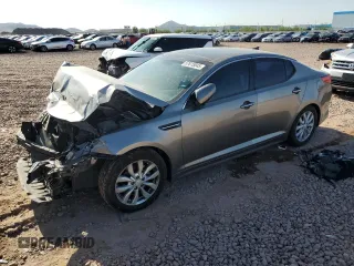 2015 Kia Optima EX z VIN 5XXGN4A70FG496010, wystawiony jako Copart lot #57615845 z przebiegiem 119 561 mil mil oraz Szkoda całkowita • Salvage title. Historia ofert i sprzedaży dostępna na DreamBid. Obrazek 1.