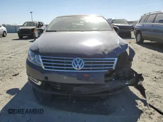 2014 Volkswagen CC Sport with VIN WVWBP7AN1EE506177, listed as a Copart auction lot 76997114 with 117,039 mi miles and Salvage Title. Bid and sale history available at carsss.com. Image 5.