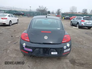 2012 Volkswagen Beetle 2.5L PZEV with VIN 3VWJP7AT0CM628169, listed as a IAAI auction lot 41628754 with 64,770 mi miles. Bid and sale history available at carsss.com. Image 16.