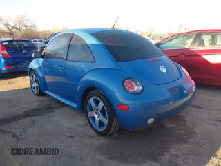 2004 Volkswagen New Beetle Coupe Satellite Blue with VIN 3VWGK31C84M420043, listed as a IAAI auction lot 41871049 with 251,646 mi miles. Bid and sale history available at carsss.com. Image 3.