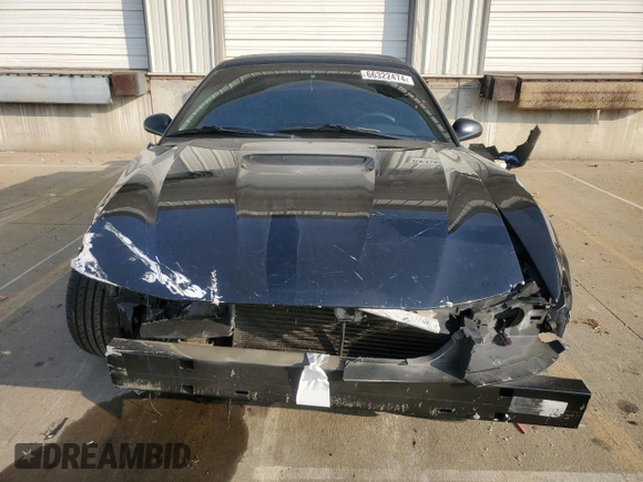 2004 Ford Mustang GT Deluxe z VIN 1FAFP45X44F239496, wystawiony jako Copart lot #66322474 z przebiegiem Nie podano mil oraz Szkody całkowita. Historia ofert i sprzedaży dostępna na DreamBid. Obrazek 5.