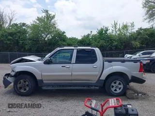 2005 Ford Explorer Sport Trac XLS z VIN 1FMZU77K55UB51889, wystawiony jako IAAI lot #42279164 z przebiegiem 210 081 mil mil oraz . Historia ofert i sprzedaży dostępna na DreamBid. Obrazek 14.