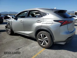 2021 Lexus NX 300 with VIN JTJGARBZ7M2191564, listed as a Copart auction lot 57974155 with 52,499 mi miles and Salvage title. Bid and sale history available at DreamBid. Image 2.