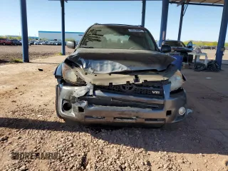 2010 Toyota RAV4 Sport with VIN JTMWK4DV9AD003233, listed as a Copart auction lot 53918805 with 147,127 mi miles and Salvage title. Bid and sale history available at DreamBid. Image 5.