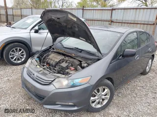 2010 Honda Insight EX with VIN JHMZE2H7XAS024879, listed as a IAAI auction lot 42029553 with 187,648 mi miles. Bid and sale history available at carsss.com. Image 6.