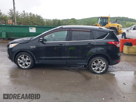 2015 Ford Escape Titanium с VIN 1FMCU9J95FUA75924, выставлен на аукционе IAAI как лот 42329222 с пробегом 123 817 миль миль и . История ставок и продаж доступна на DreamBid. Изображение 14.