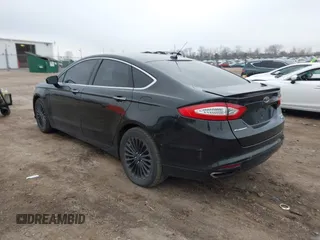 2013 Ford Fusion Titanium with VIN 3FA6P0D99DR130031, listed as a IAAI auction lot 41885596 with 174,687 mi miles. Bid and sale history available at carsss.com. Image 3.