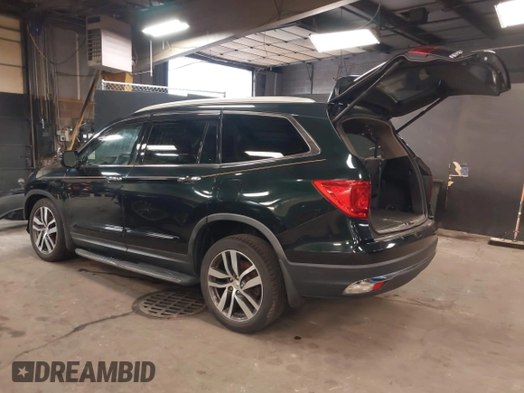 2016 Honda Pilot Touring with VIN 5FNYF6H98GB035226, listed as a IAAI auction lot 42022957 with 103,842 mi miles and . Bid and sale history available at DreamBid. Image 3.